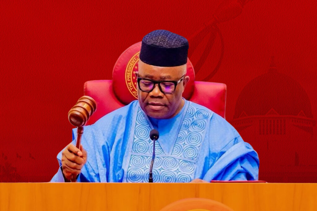 Godswill Akpabio holding a gavel