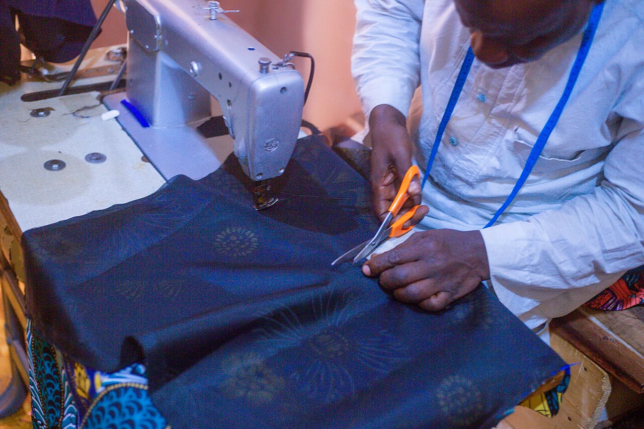 A tailor at work in northern Nigeria (file photograph)